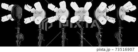 4 lightbulbs in lamp holder on studio stand isolated on black background 4 lightbulbs in lamp holder on studio stand isolated on black background 73516907