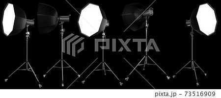 Photo studio lighting stands with flash and softbox isolated on the black. Photo studio lighting stands with flash and softbox isolated on the black. 73516909