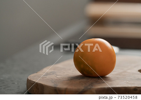 Lulo fruit on olive wood board on kitchen countertop Lulo fruit on olive wood board on kitchen countertop 73520458