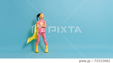 child playing superhero child playing superhero 73522662