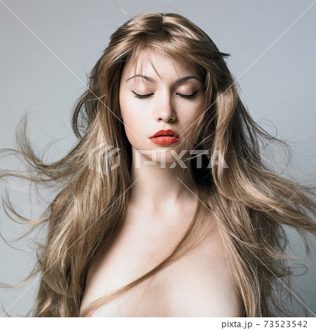 Sexy young woman with blonde hairs Sexy young woman with blonde hairs 73523542
