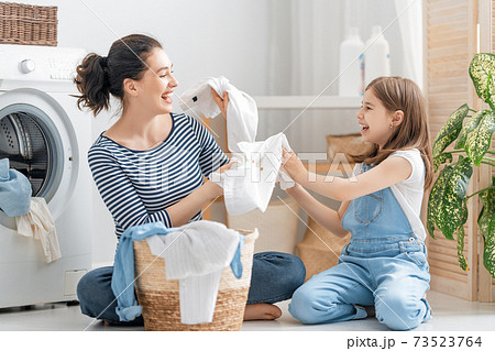 family doing laundry 73523764