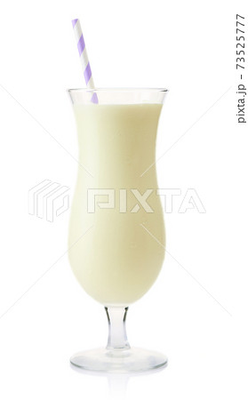 Glass of vanilla milkshake isolated on white Glass of vanilla milkshake isolated on white 73525777