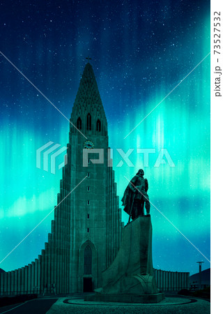 Aurora borealis Northern lights shining over the church in Reykjavik 73527532