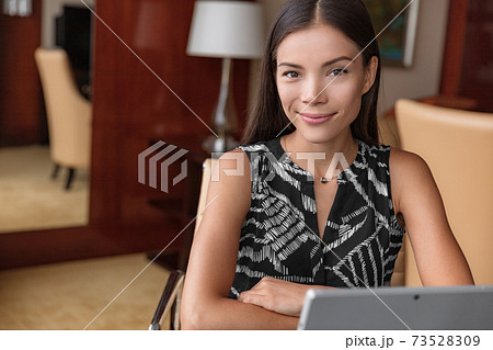 Asian professional woman portrait. Young confident multiracial chinese office worker smiling businesspeople: lawyer, accountant entrepreneur working at home remote freelance work 73528309