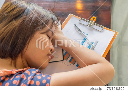 Top view photo of overworked woman fall asleep at office 73528892