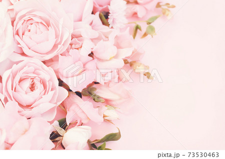 Delicate blossoming pink rose frame, blooming flowers pastel festive background, soft bouquet floral card, selective focus, toned Delicate blossoming pink rose frame, blooming flowers pastel festive background, soft bouquet floral card, selective focus, toned 73530463