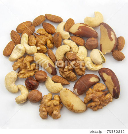 different nuts on a white background. protein and healthy food 73530812