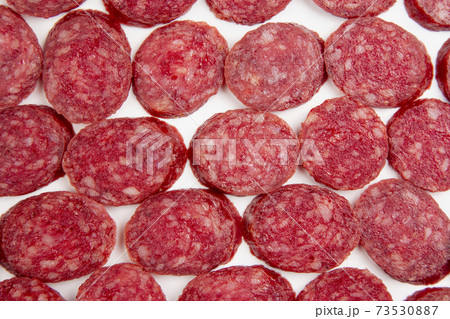 salami on a white background. fast food and breakfast 73530887