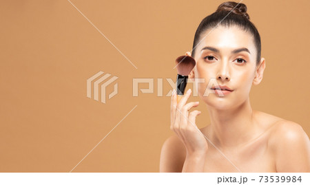 Beauty asian woman hold make up brush and cheerful with make up brush Beauty asian woman hold make up brush and cheerful with make up brush 73539984