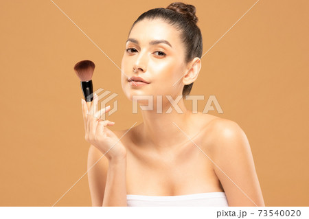 Beauty asian woman hold make up brush and cheerful with make up brush Beauty asian woman hold make up brush and cheerful with make up brush 73540020