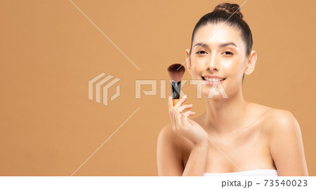 Beauty asian woman hold make up brush and cheerful with make up brush Beauty asian woman hold make up brush and cheerful with make up brush 73540023