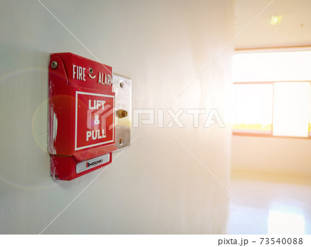 Fire alarm on the wall of the industrial plant Fire alarm on the wall of the industrial plant 73540088