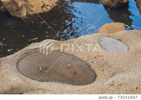 Turquoise water of the mountain river Ganges among white smooth stones. Gangotri. Uttarkashi district 73541607