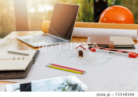 Engineer and Architect concept, Engineer Architects and Interior designer working with blueprints Engineer and Architect concept, Engineer Architects and Interior designer working with blueprints 73548566