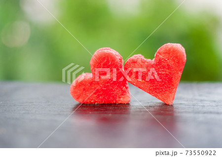 Water melon cut into heart shape. Flat lay composition. love concept. Valentine's Day 73550922
