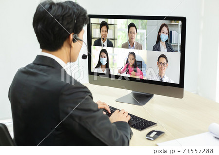 businessman on desk workplace connect video call with many people work from home businessman on desk workplace connect video call with many people work from home 73557288