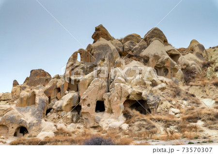 Landscape view of Uchisar, Cappadocia, Turkey under cloudy sky Landscape view of Uchisar, Cappadocia, Turkey under cloudy sky 73570307