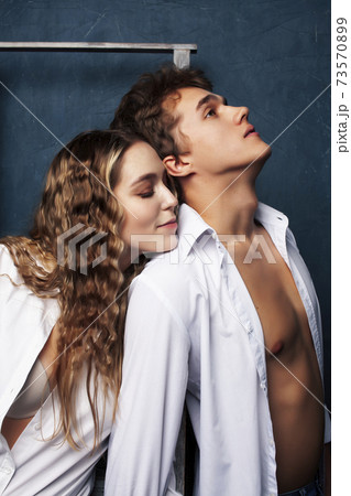 young pretty boy and girl friends happy smiling together in interior, emotional couple, lifestyle people concept 73570899