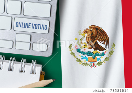 Online voting concept in United Mexican States. Keyboard near country Mexico flag. 73581614