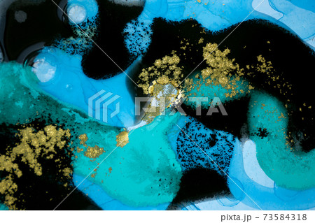Abstract gold, black and blue liquid pattern. 73584318