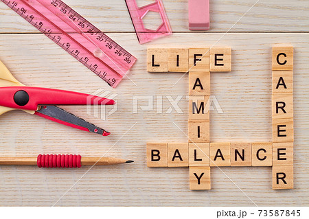 Top view of crossword with career balance concept. 73587845