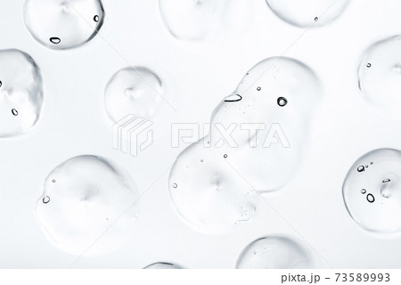 Transparent hyaluronic acid gel on a white background. 73589993