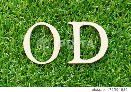 Alphabet letter in word OD (Abbreviation of overdraft) on green grass background Alphabet letter in word OD (Abbreviation of overdraft) on green grass background 73594685