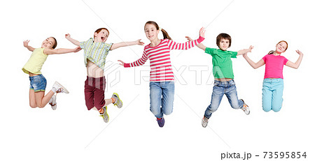 Joyful Children Jumping In Mid-Air Posing Over White Background Joyful Children Jumping In Mid-Air Posing Over White Background 73595854