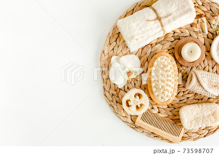 Spa Background. Natural Organic spa cosmetics products, eco friendly bathroom accessories. Skincare concept on white background. Flat lay, top view Spa Background. Natural Organic spa cosmetics products, eco friendly bathroom accessories. Skincare concept on white background. Flat lay, top view 73598707
