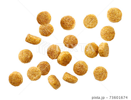 Dry pet food flies on a white background. Isolated Dry pet food flies on a white background. Isolated 73601674