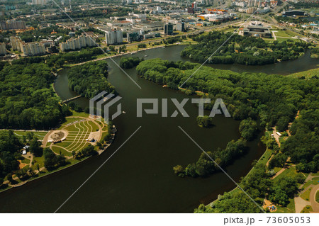 Top view of the victory Park in Minsk and the Svisloch river.A bird's-eye view of the city of Minsk and the Park complex.Belarus Top view of the victory Park in Minsk and the Svisloch river.A bird's-eye view of the city of Minsk and the Park complex.Belarus 73605053