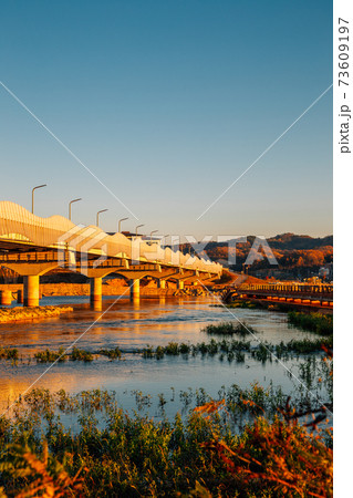 Nakdonggang riverside park at sunset in Andong, Korea Nakdonggang riverside park at sunset in Andong, Korea 73609197