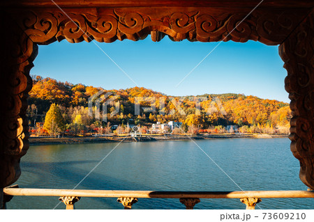 Panoramic view of Nakdong river and autumn mountain from Woryeonggyo Bridge in Andong, Korea 73609210
