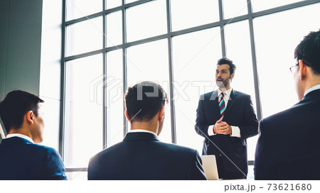 Group of business people meeting in a seminar conference 73621680