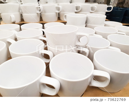 White cups a lot. Store warehouse. 73622769