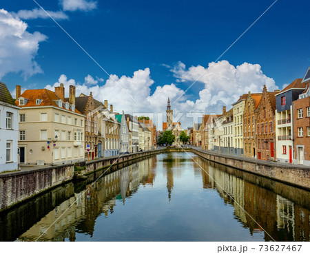 Bruges (Brugge) cityscape with water canal Bruges (Brugge) cityscape with water canal 73627467