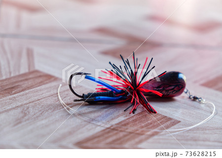 Fishermans Artificial Fishing Lure, Fishing Bait with Sharp Hooks on the Floor Prepare for Fishing 73628215