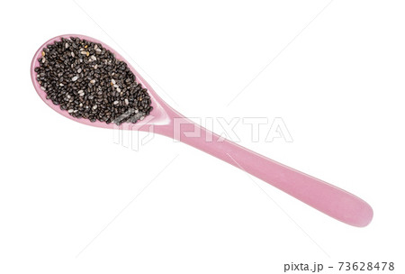 top view of Chia seeds in ceramic spoon cutout 73628478