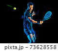 Paddle tennis player man light painting isolated black background 73628558