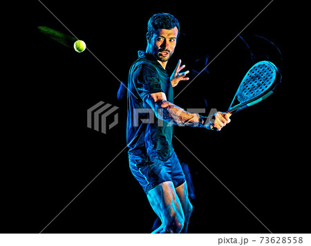 Paddle tennis player man light painting isolated black background Paddle tennis player man light painting isolated black background 73628558