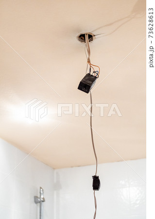 electronic transformer hanging on electric wires 73628613