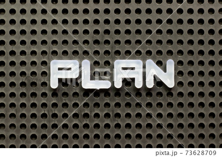 White color letter in word plan on black pegboard background 73628709