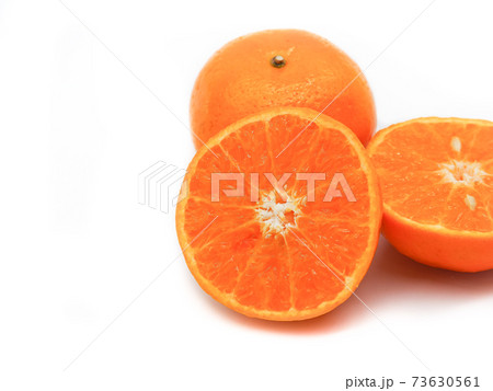 Fresh orange fruit on a white background. 73630561