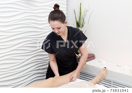 Session of massage of female feet in the spa salon Session of massage of female feet in the spa salon 73631041