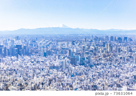 スカイツリーから見た東京の街並みと富士山の写真素材