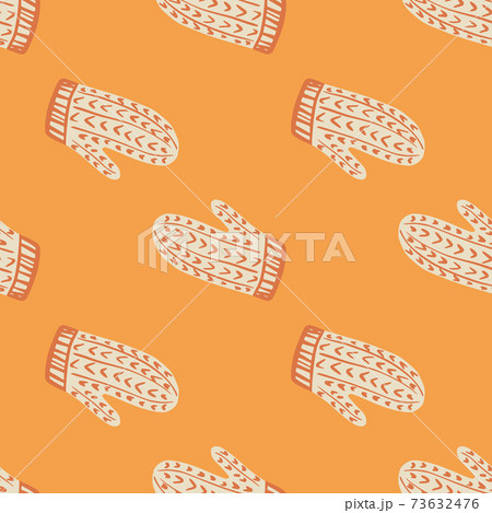 White mittens with red ornament seamless doodle pattern. Orange bright background. Season winter print. White mittens with red ornament seamless doodle pattern. Orange bright background. Season winter print. 73632476