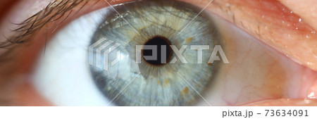 Close-up eyes and healthy male pupil blue colors 73634091