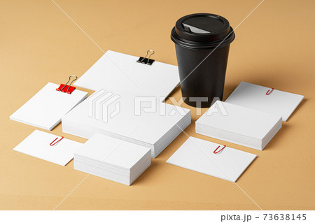 Blank takeaway coffee cup and white businesscards Blank takeaway coffee cup and white businesscards 73638145