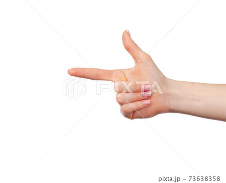 Female hand pointing to the left with her finger 73638358
